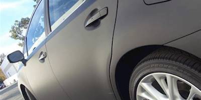 Matte Black and Carbon Fiber Vehicle Wrap - Lexus hs