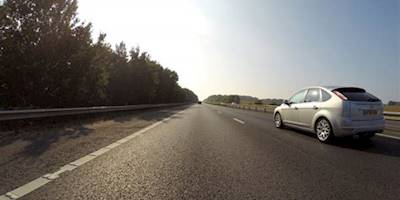 Silver Ford Focus 5-door Hatchback Speeding on Road · Free ...